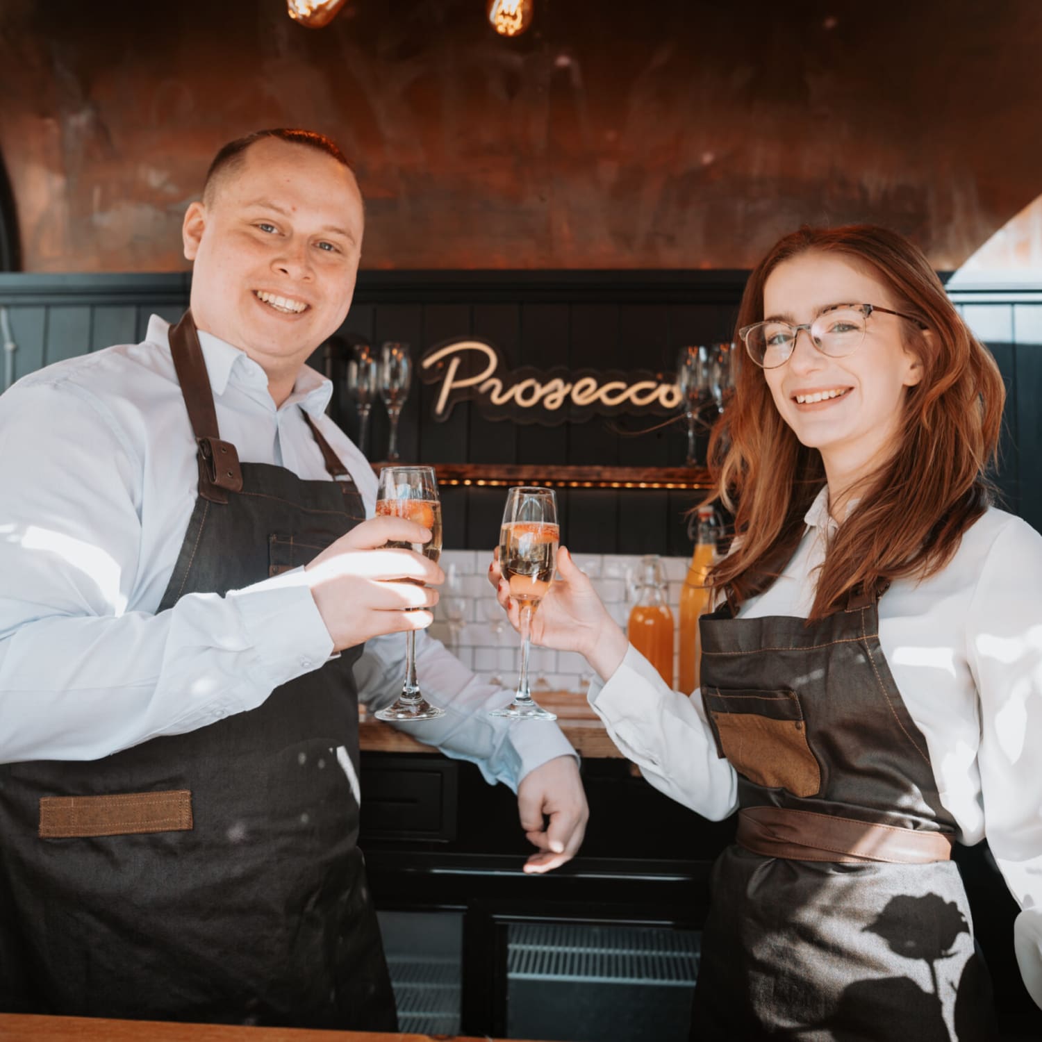 Brendan and Sara, owners of The Bubble Box in their mobile Prosecco bar.